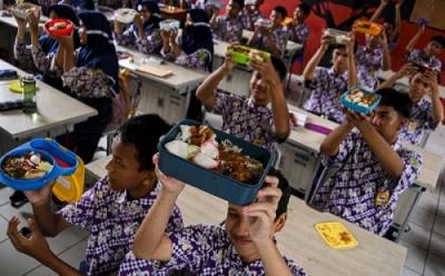 Makan Bergizi Gratis: Indonesia Siap Gelontorkan Ribuan Ton Beras, Daging, dan Telur Setiap Hari?